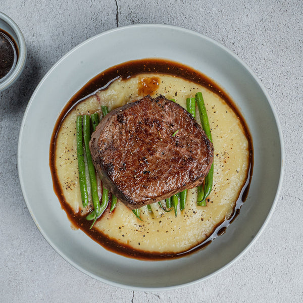 Beef Steak with Truffle Polenta & Cranberry Jus