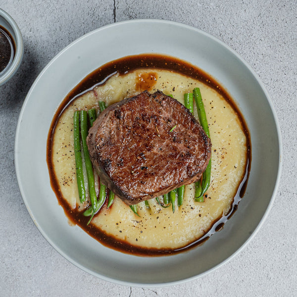 Beef Steak with Truffle Polenta & Cranberry Jus